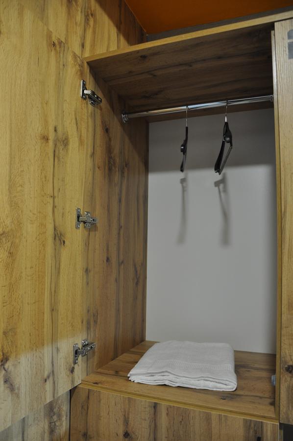 Full House Capsule Hostel Rivne Extérieur photo A pair of compasses